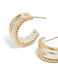 Elegant mixed metal triple layered small hoop earrings featuring gold plated and silver materials close up view - link has visual effect only