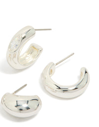 Highlighting silver plated cubic zirconia bezel and chubby open hoop earrings in a 2-pack post detail view - link has visual effect only