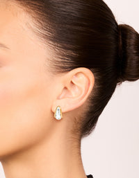 Featuring mixed metal plated small teardrop drop earrings in silver and gold on ear view - link has visual effect only