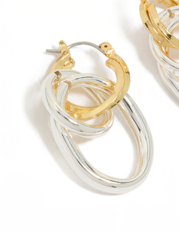 Featuring statement hoop earrings with mixed metal plated double link illusion design in gold and silver close up view