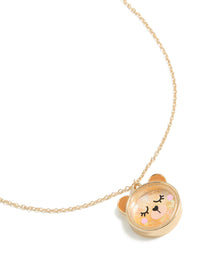 Showcasing a kids necklace with animal bear pendant in gold plated metal close up view - link has visual effect only