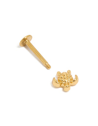 Designed with a flat back closure, this gold plated surgical steel turtle stud earring featuring ocean design details post detail view - link has visual effect only
