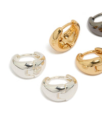Featuring mixed metal small graduated huggie earrings in a 3-pack with gold and silver plated finishes close up view - link has visual effect only