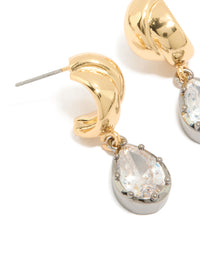 Featuring mixed metal plated cubic zirconia knot teardrop earrings highlighting stone setting and prong detail close up view - link has visual effect only