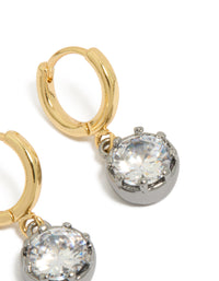Showcasing mixed metal plated cubic zirconia huggie drop earrings featuring gold and silver finish post detail view - link has visual effect only