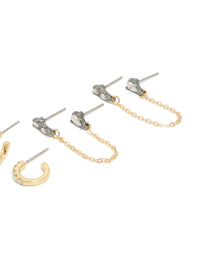Highlighting gold plated cubic zirconia chain and huggie earrings 3-pack with crystal accents post detail view - link has visual effect only