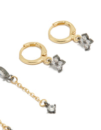 Elegant mixed metal plated cubic zirconia flower chain and huggie earrings with sparkling stones in a 3-pack set post detail view - link has visual effect only