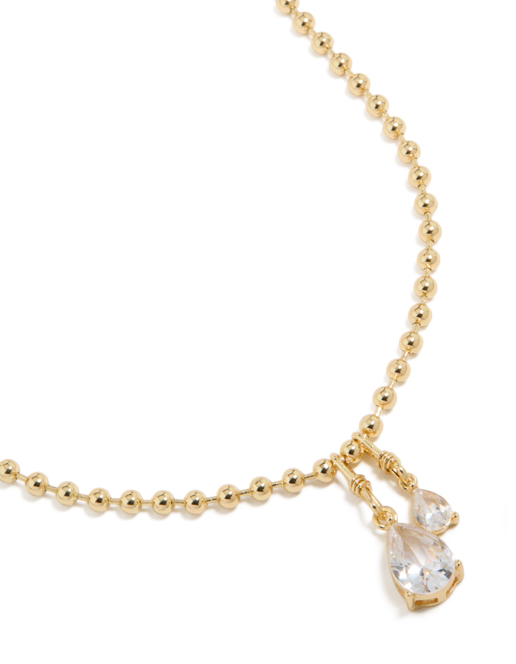 Showcasing a gold plated double cubic zirconia teardrop pendant necklace with ball chain close up view