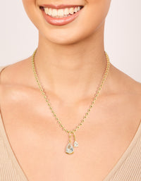Beautifully crafted gold plated double cubic zirconia teardrop pendant necklace on neck view - link has visual effect only