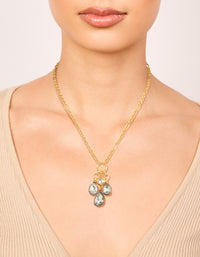 Featuring a mixed metal plated diamante cluster drop necklace with cubic zirconia in gold statement style on neck view - link has visual effect only