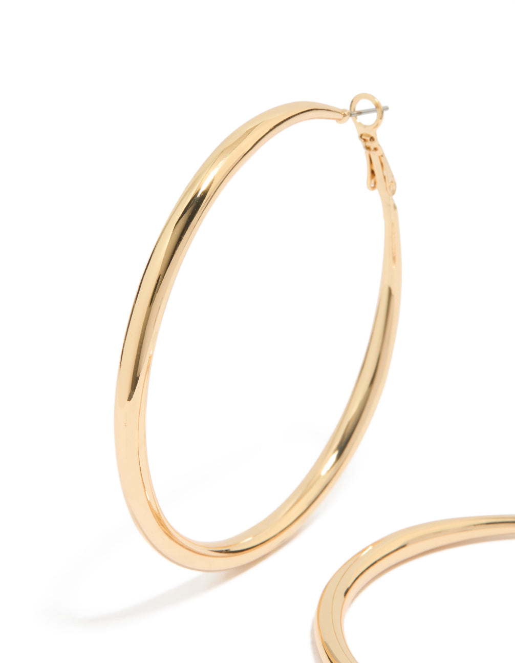 Crafted from gold plated material large hoop earrings with closure in gold close up view