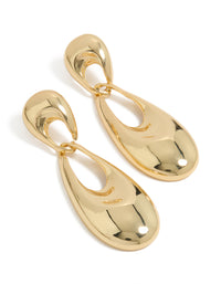 Crafted from gold plated material, these elongated oval drop earrings feature a polished finish front view - link has visual effect only
