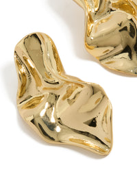 Featuring gold plated wavy organic drop stud earrings with detailed metal texture close up view - link has visual effect only
