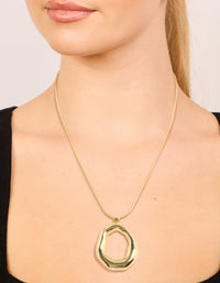 Featuring a gold plated organic circle pendant necklace on neck view - link has visual effect only