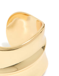Designed with gold plated wide organic wrist cuff in statement bangle style closure detail view - link has visual effect only
