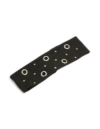 Showcasing a black eyelet wide stretch fabric headband in solid print with silver accents front view - link has visual effect only