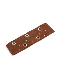 Stylish brown eyelet wide stretch fabric headband featuring silver accents front view - link has visual effect only