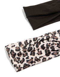 Explore black and leopard print twist stretch fabric headbands 2-pack in black, beige, rosy brown detail view - link has visual effect only