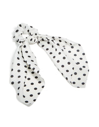 Crafted from polyester featuring polka dot print in white and black scarf scrunchie front view - link has visual effect only