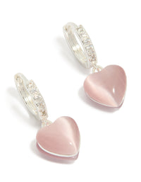Showcasing dainty hoop earrings with heart drop, crafted from silver plated cubic zirconia in light pink front view - link has visual effect only