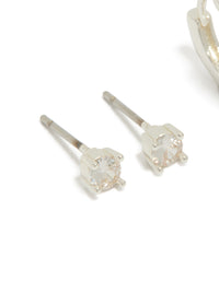 Designed with silver plated cubic zirconia studs and flower huggie earrings in a 2-pack close up view - link has visual effect only