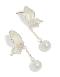 Showcasing silver plated enamel butterfly pearl drop earrings with charm accents in ivory and light pink front view - link has visual effect only