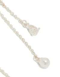 Highlighting silver plated cubic zirconia moon and butterfly drop earrings featuring celestial charm pearl teardrop post detail view - link has visual effect only