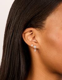 Displaying teardrop floral cubic zirconia earrings with silver plated finish in a 2-pack on ear view - link has visual effect only