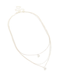 Featuring a triple-layered drop necklace with beads, round-cut cubic zirconia, crafted from silver-plated material in a silver color front view - link has visual effect only
