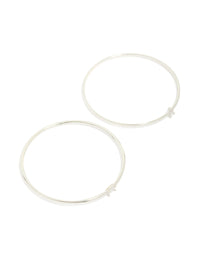 Beautifully crafted silver plated rectangular and teardrop cubic zirconia bangles in a 2-pack front view - link has visual effect only