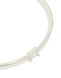 Displaying silver plated rectangular and teardrop cubic zirconia bangles in a 2-pack close up view - link has visual effect only