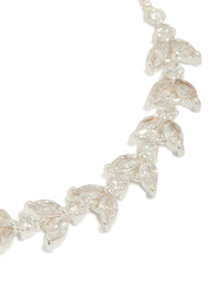 Designed with silver plated cubic zirconia, this vine leaf toggle bracelet showcases a statement style close up view - link has visual effect only