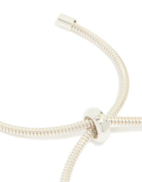 Silver plated diamante heart rondell charm bracelet with beads highlighting toggle closure detail view - link has visual effect only