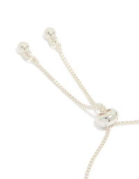 Highlighting a silver plated toggle bracelet with smooth butterfly charms and cubic zirconia inlay closure detail view - link has visual effect only