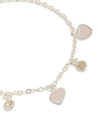 Showcasing silver plated cubic zirconia heart charms toggle bracelet close up view - link has visual effect only
