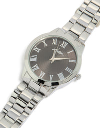 Discover a men's silver classic round watch with roman numeral black dial, link band, and formal analog design watch face detail view - link has visual effect only