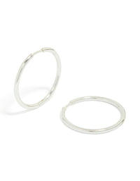 Discover waterproof silver plated stainless steel clicker hoop earrings in 30 MM front view - link has visual effect only