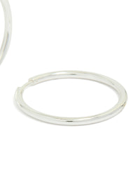 Crafted from waterproof silver plated stainless steel, these clicker hoop earrings in 30 MM post detail view - link has visual effect only