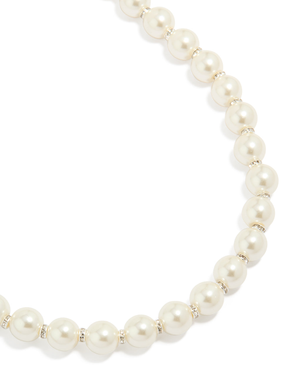 Beautifully crafted pearl necklace featuring silver plated rondells in ivory close up view