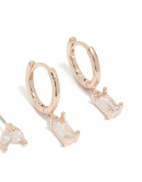 Crafted from rose gold plated cubic zirconia stud and huggie earrings 2-pack with baguette stone cut post detail view - link has visual effect only