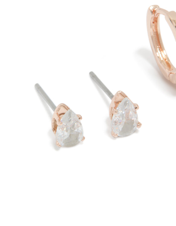 This elegant set showcases teardrop cubic zirconia stud earrings with rose gold plating in a close up view