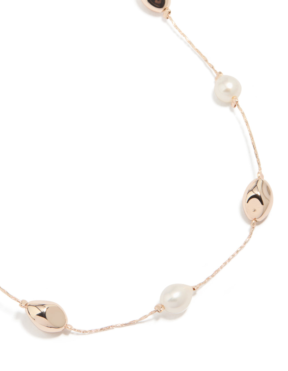 Crafted from rose gold plated material featuring molten balls with beads and freshwater pearl necklace close up view