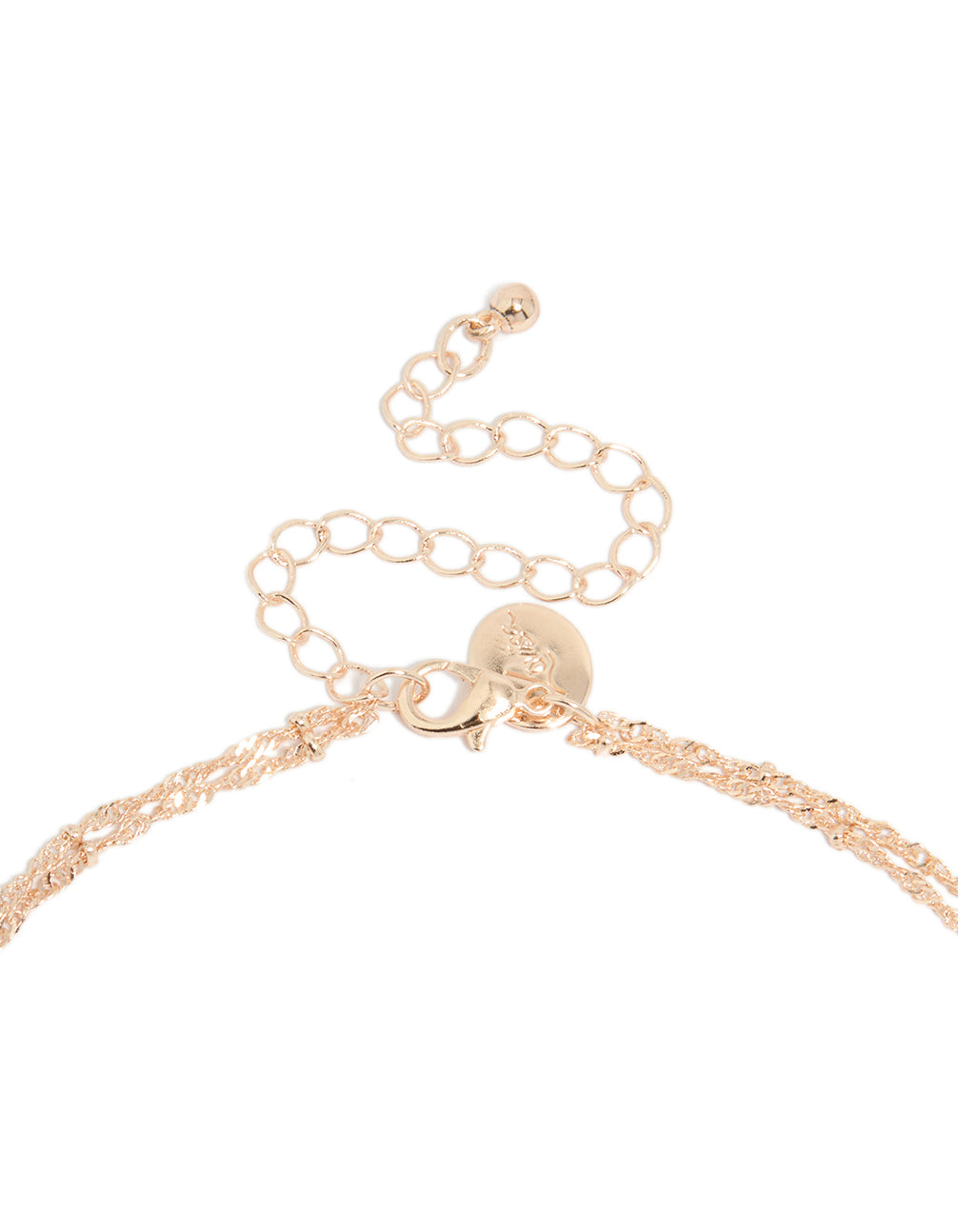 Beautiful rose gold plated cubic zirconia bezel set layered chain Y-necklace with statement styling clasp detail view