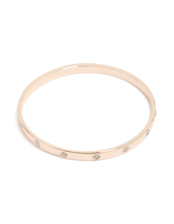 Showcasing a rose gold plated diamante flowers bangle front view