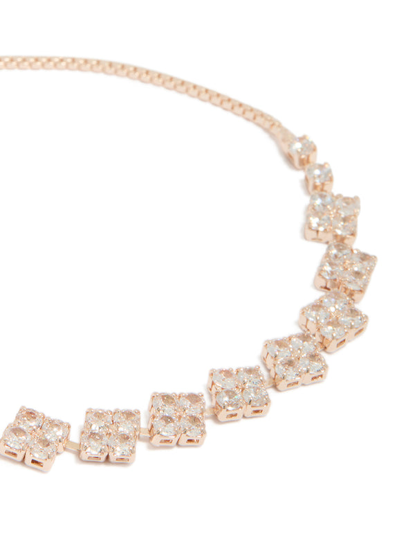 Highlighting floral rose gold plated cubic zirconia toggle bracelet close up view