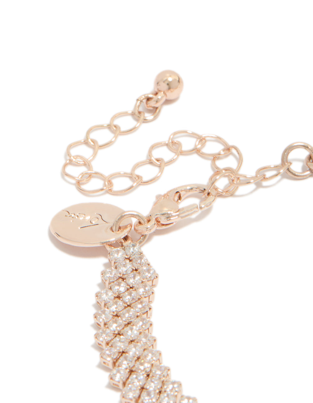Crafted from rose gold plated cubic zirconia round diagonal tennis bracelet closure detail view