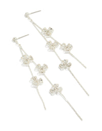 Showcasing dainty floral drop earrings in silver with delicate design and clear accents front view - link has visual effect only