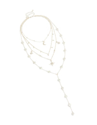 Crafted from silver, this diamante celestial multi pearl layered Y-necklace features charm, star, and moon accents in statement design front view - link has visual effect only