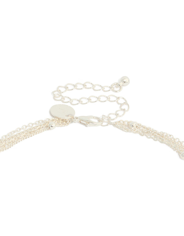 Featuring a diamante celestial multi pearl layered Y-necklace with charm, star, moon details and adjustable closure in statement style clasp detail view