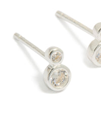 Beautiful double bezel set stud earrings featuring cubic zirconia in sterling silver close up view - link has visual effect only